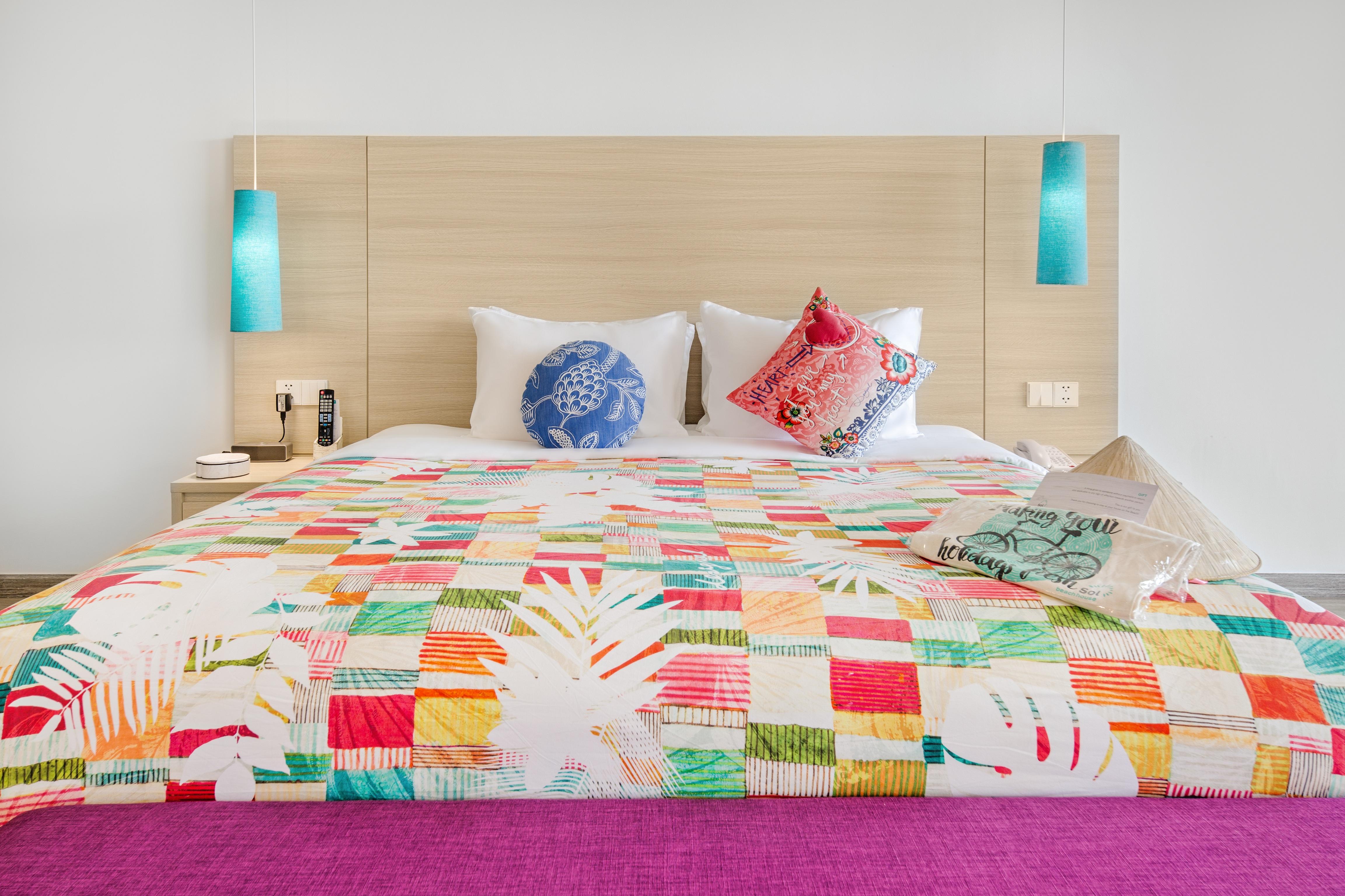 Sol By Melia Phu Quoc Hotell Exteriör bild A bed with a duvet